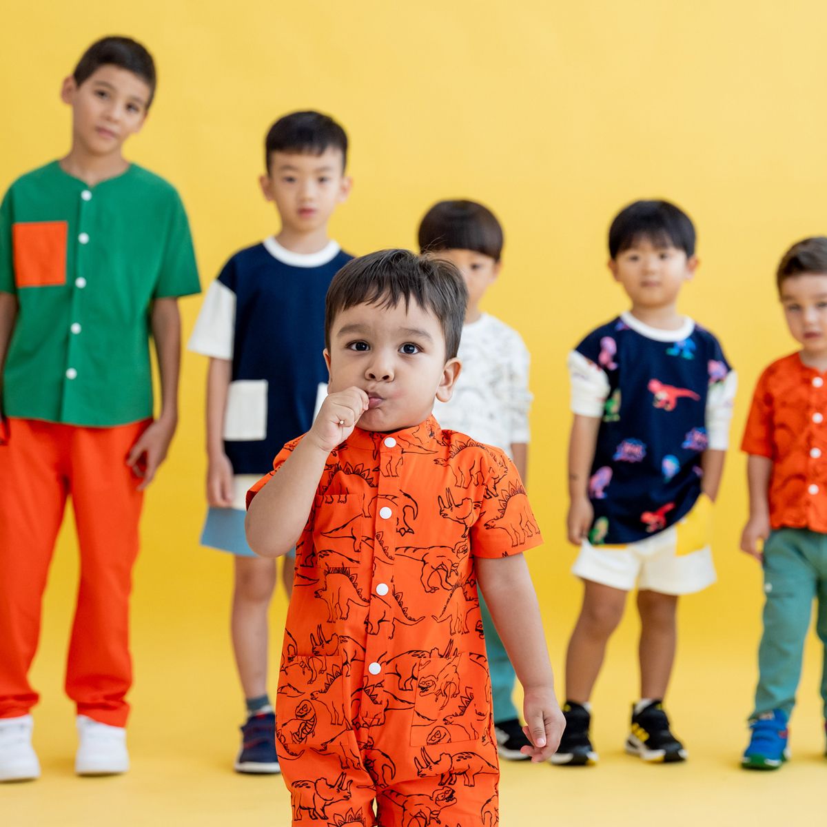 Made for Play - Baby Playsuit in Dino Sketch Print in Orange by Le Petit Society - Image 3
